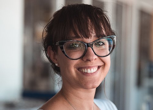 smiling women with glasses