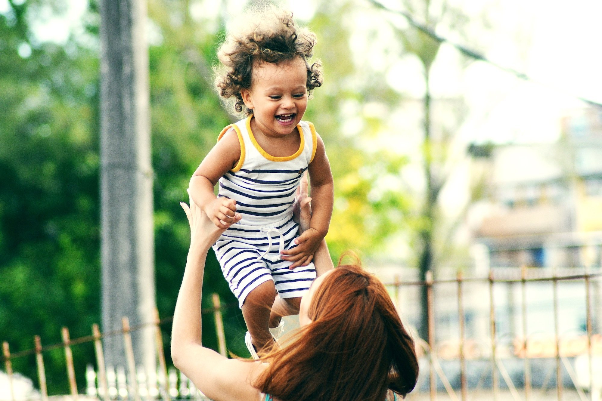 happy child after parents divorced with the help of child therapy Simi Valley ca