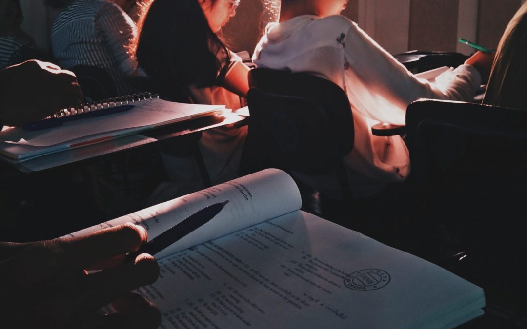 group of students studying in a class