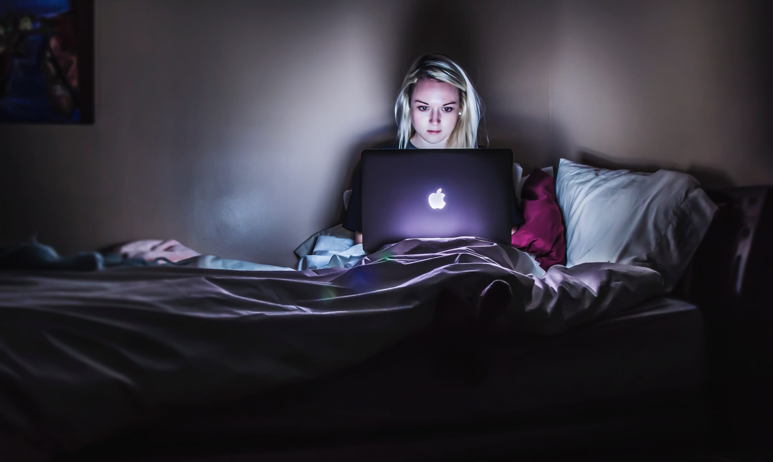 teen girl using macbook 