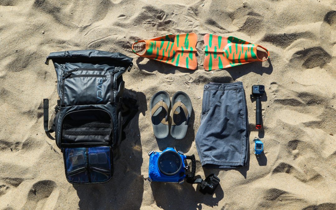 beach gear laid out on sand