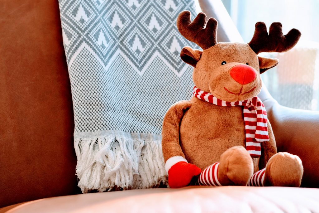 stuffed reindeer on a chair 