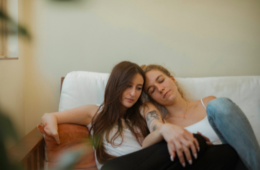 lesbian couple feeling sad after sharing trauma in in person couples counseling near Thousand Oaks, ca, 91320